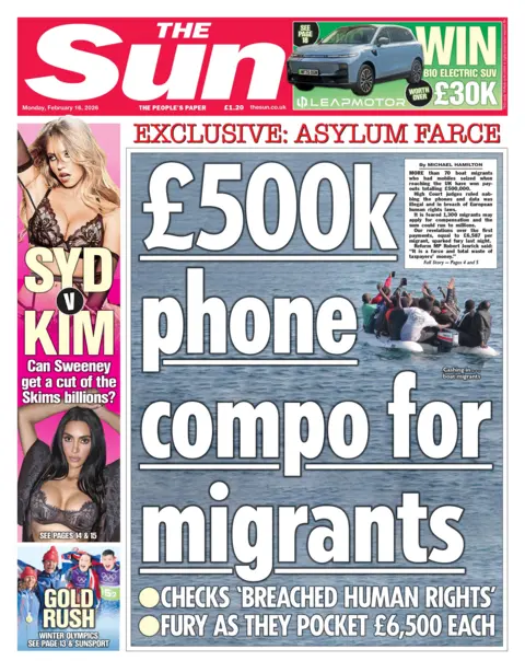  "£500k phone compo for migrants."