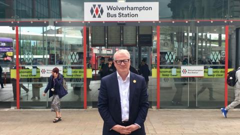 Richard Parker standing outside Wolverhampton bus station