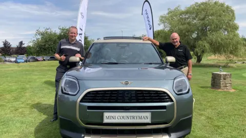 David Haimes (left) with the tournament's sponsor Roger South