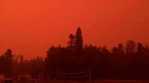 The sky is orange due to Canada's wildfires.