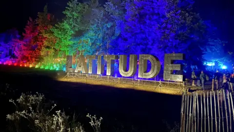 Chloe Stanton / BBC Latitude festival sign at night