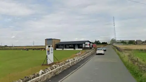 Google A Google Maps image of Queensbury Cricket Club, which is separated from the proposed development by a road.