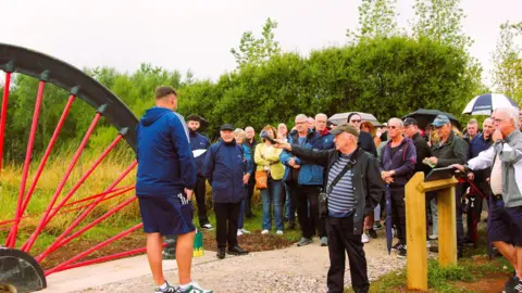 Darron Ellis Craig Gould making a speech at the unveiling