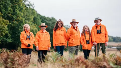 The Royal Parks Volunteer Rangers posing for a picture