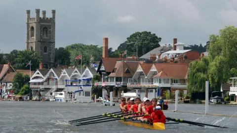 A crew rows on the River Thames at the Henley Royal Regatta.
