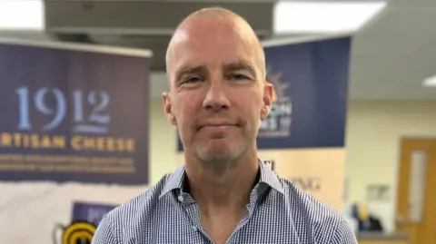 BBC Bill Mathieson stood looking into the camera for a photo