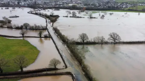 Drone shot of flooding in Axminster, Devon, caused by Storm Chandra