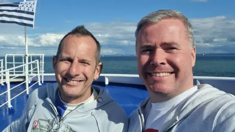 Contributor photo Tony and Mike smiling