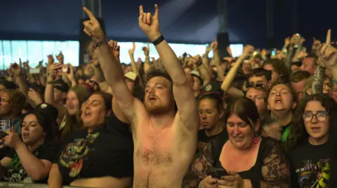 PA Media Rock fans at Download Festival inside a tent