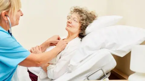 Getty Images Woman successful  infirmary  bed