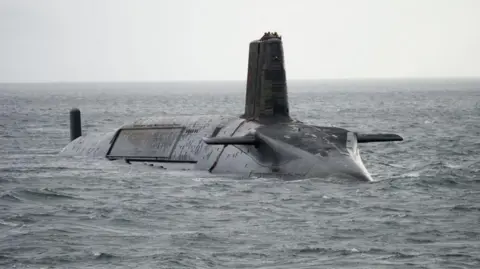 PA Media A partially submerged missile-armed Vanguard-class submarines