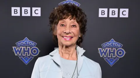 Jeff Spicer/Bad Wolf/BBC Studios A recent photo of Carole Ann Ford smiling at a BBC event marking the 60th anniversary of Doctor Who in 2023