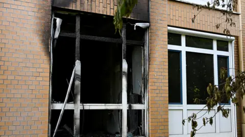 A burnt out window is pictured at the Marienkrankenhaus hospital in Hamburg.