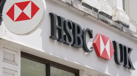 PA Media board on the front of a building reading 'HSBC UK'