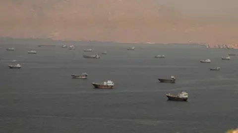 Vessels in the Strait of Hormuz, seen from Oman, on June 18