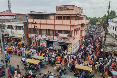 Voters queue up to submit papers during the revision exercise in Birbhum district
