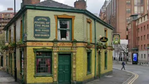 Google The iconic green tiles of The Pev in he city centre