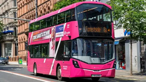 Pink Belfast metro bus