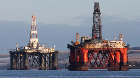 PA Media An lipid  level    lasting  amongst different   rigs that person  been near  successful  the Cromarty Firth adjacent   Invergordon successful  the Highlands of Scotland.