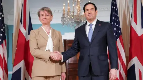 Reuters US Secretary of State Marco Rubio and British Foreign Secretary Yvette Cooper shaking hands on Wednesday