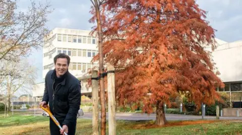 Leicestershire County Council Blake Pain planting tree