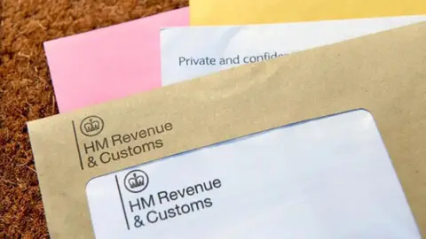 A collection of envelopes and letters sent from HM Revenue and Customs.