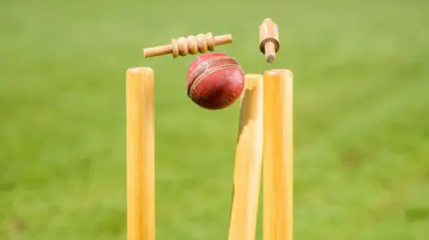 Getty Images A cricket ball dislodging cricket stumps