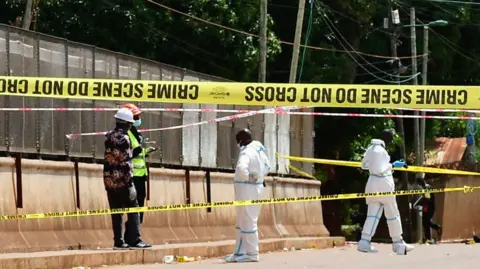 Forensic personnel at the crime scene