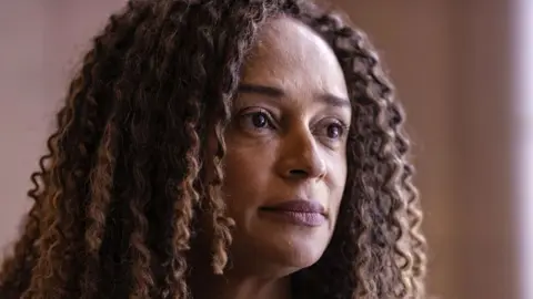 Close-up of Isabel dos Santos with ringlet braids - taken in Dubai in 2021