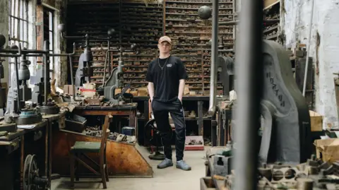 Tom Bird Dion Kitson in a disused silver factory