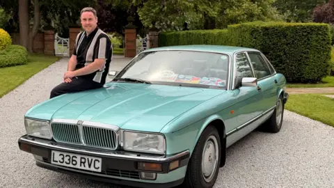 Paul Keating Paul Keating sits on the driver's side win of his Jaguar XJ40, in its limited edition peppermint shade of paint, on the drive at Wappenbury Hall, the former home of Sir William Lyons.