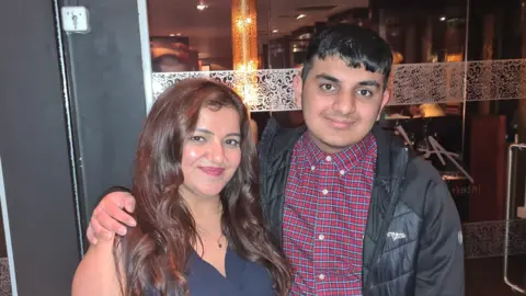 Family Ronan Kanda with his mother