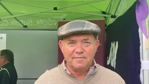 Alice Whaley/BBC Gary Perkins at the rally