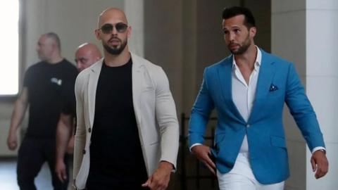 The Tate brothers arrive at a court hearing in Bucharest