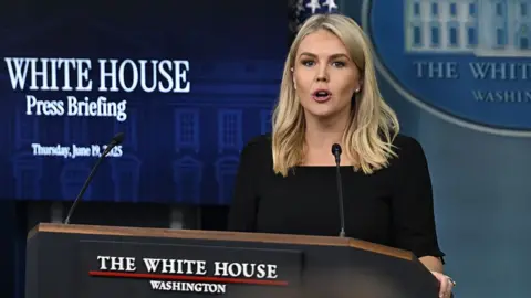 Getty Images White House press secretary Karoline Leavitt speaks at the White House Press Briefing room in Washington DC on 19 June 2025.
