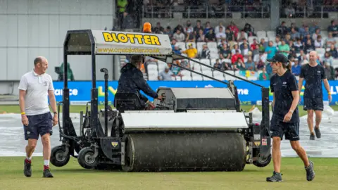 SWPix.com Groundstaff at Headingley pressing the field