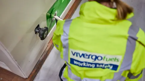 Vivergo Vivergo employee wearing yellow florescent jacket  