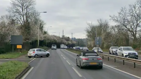Cars on a dual carriageway on a dull day 