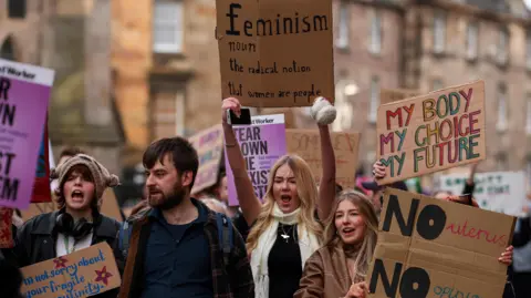 A number of people at a Women's March event in Edinburgh 