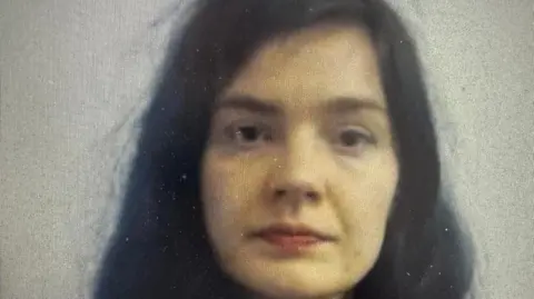 Supplied A woman with shoulder lenght dark hear stares at the camera.