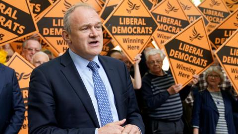 Liberal Democrat leader Sir Ed Davey makes a speech during a visit to the town centre in Cheltenham, Gloucestershire, while on the General Election campaign trail