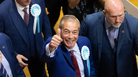 Getty Images Reform UK leader Nigel Farage celebrates winning the Clacton seat in the general election