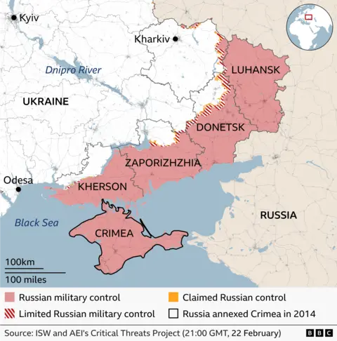 Map of Ukraine showing regions under Russian military control shaded red, limited control in red stripes, and claimed control shaded yellow as of 18 February. The regions of Luhansk, Donetsk, Zaporizhzhia, Kherson – with almost all of Luhansk shaded red and much of the other three provinces also under Russian control. Crimea which was annexed by Russia in 2014 is also are marked as under Russian control. Major cities labelled include Kyiv, Kharkiv, and Odesa. Source: ISW
