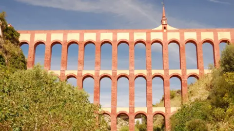 The brick arches of a viaduct in a gorge in Spain