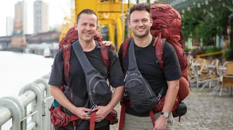 BBC Scott and Sam with their rucksacks prepare to leave port city Belém, northern Brazil 