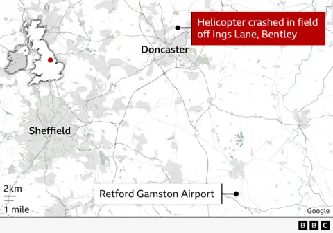 Map showing the location of a helicopter crash near Doncaster, England. The crash occurred in a field off Ings Lane in Bentley, just north of Doncaster. The map also marks Retford Gamston Airport to the southeast and Sheffield to the southwest for reference. A small inset map of the UK highlights the crash area in northern England.