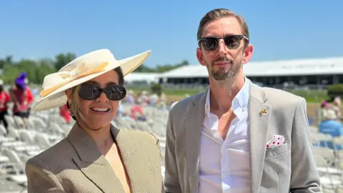 BBC/Brandon Drenon Two people pose for a photo at Pimlico