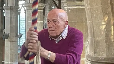 John Bennett bell ringing inside the tower at St Mary Magdalene Church, Gedney