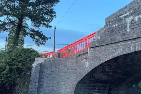 Barrow Bridge, bridge 16 of Trent and Mersey Canal on 2 May 2024