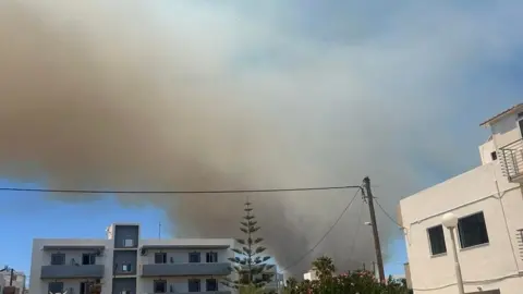 Chelsea Dick Smoke from the wildfire in Kos